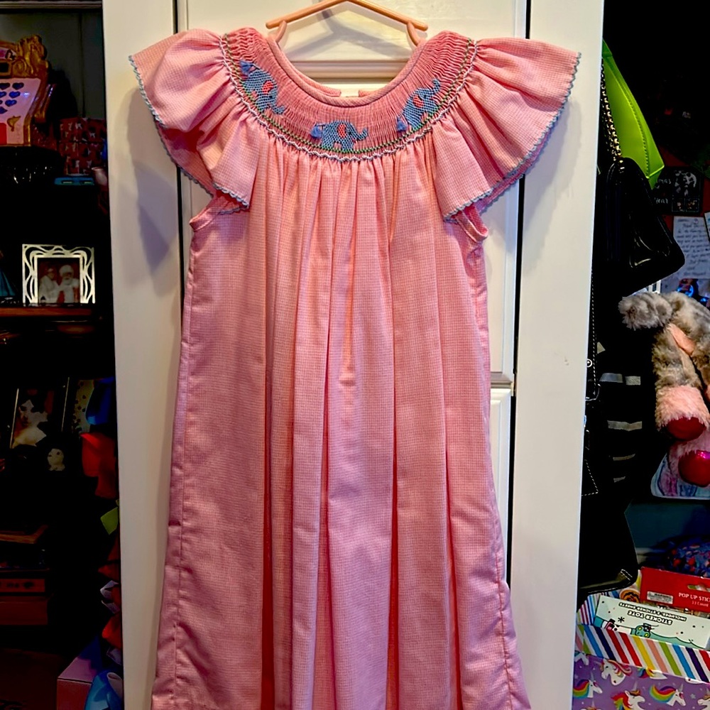 Little girl’s Edge Hill pink, checked, smocked dress with blue elephants. 4T